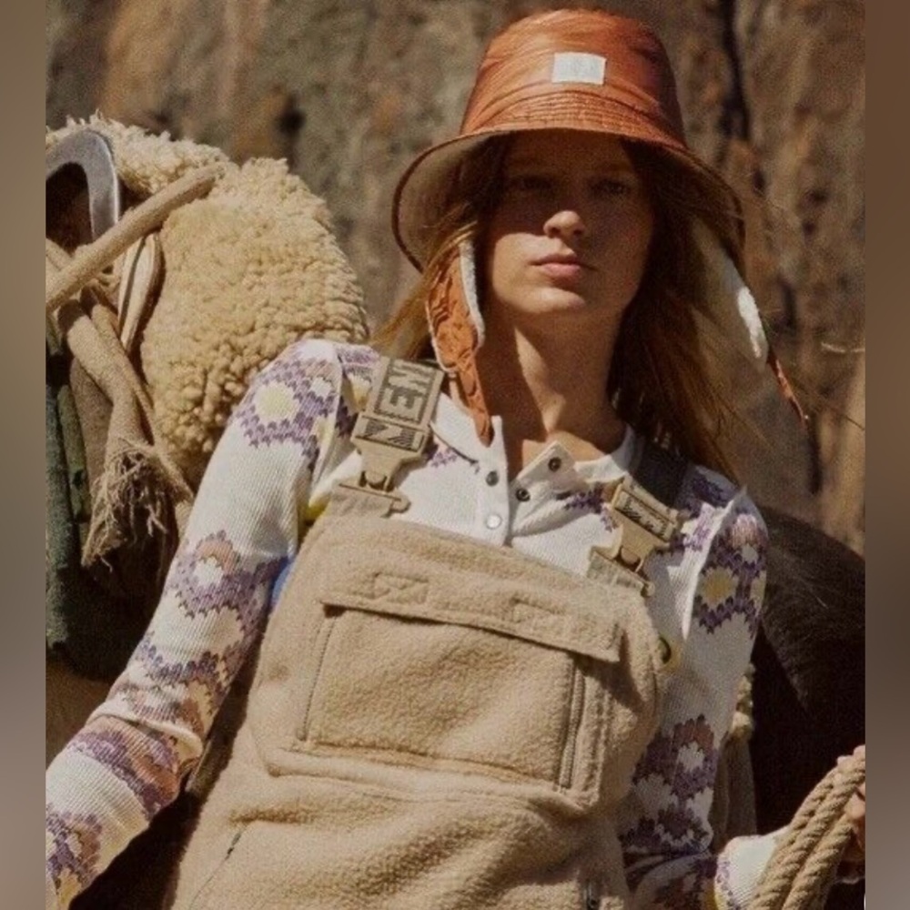 Free People reversible Sherpa bucket hat in peach/copper one size